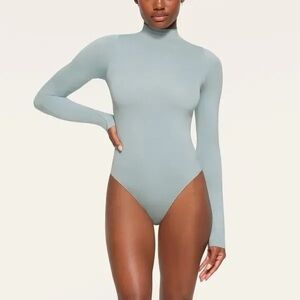 SKIMS Essential Mock Neck Long Sleeve Bodysuit in Denim size XXS